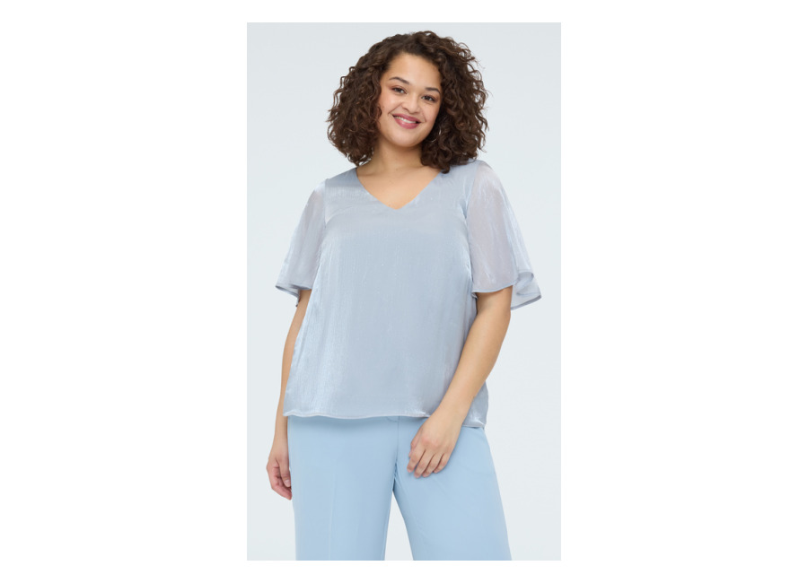 Fiorella Rubino Blusa textura metalizada con puntos de luz